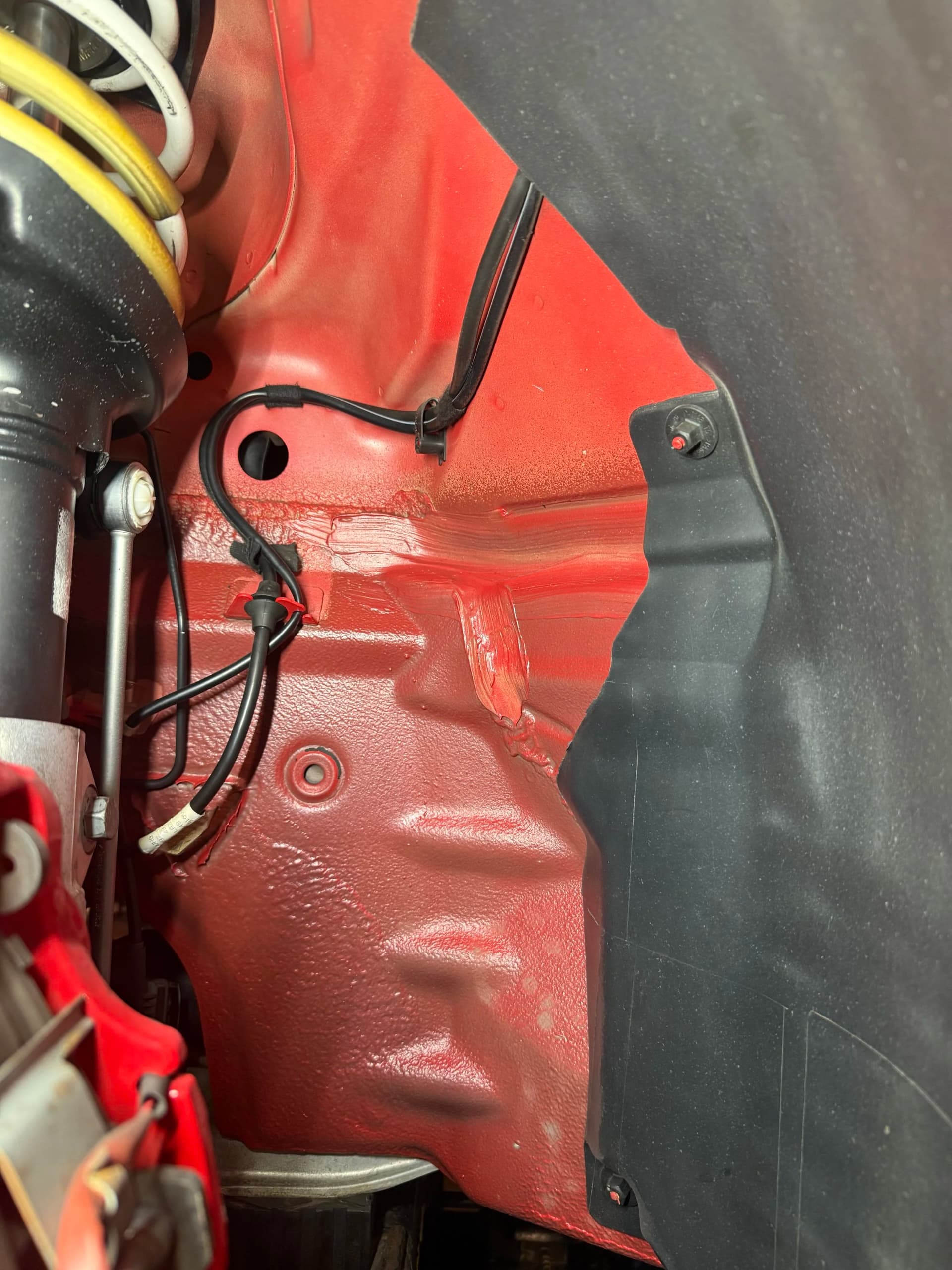 Porsche 911 Wheel Well after dry ice blasting in Milwaukee